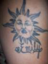 Sun with daughters name tattoo