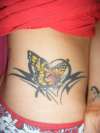 Tribal and Butterfly.... tattoo