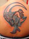 Fairy on moon tattoo