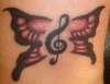MissKitKats TrebleClef Butterfly tattoo