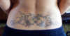 Hibiscus Flowers with waves on Lower Back tattoo