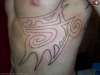 tribal ribs outline tattoo