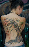 sidesaddle tree tattoo