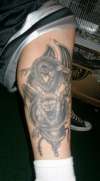Dragon/lion tattoo
