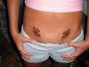 lower stomach butterflys tattoo