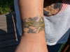 wrist band tattoo