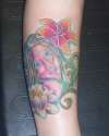 Custom fairy and flowers tattoo
