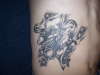 harmony&tragedy on my stomach tattoo