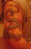 Dragon, left arm tattoo