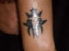kottonmouth kings logo by chris needs to be recolored in tattoo