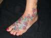 flower on foot tattoo