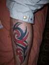 tribal leg design tattoo