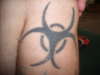 bio hazard (its not my ass its my leg ) tattoo