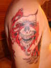 Skeleton Rip Out tattoo