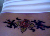 Lowerback roses tattoo