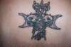 Evil Cross on my back tattoo