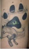 Fox and dog paw tattoo
