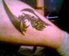 left leg tattoo