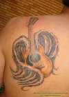 Winged Guitar tattoo