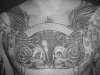 unfinished chest piece tattoo