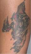 3rd Tat tattoo