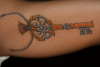Key to her heart tattoo