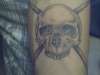 Skull and Drumsticks on Forearm tattoo