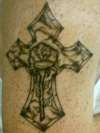 first cross tattoo