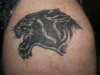 Panther on lower leg. tattoo