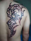 biomopic/tribal tattoo
