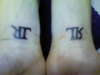 ? hmm..right..o...left...? tattoo