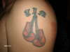 Name with boxing gloves tattoo
