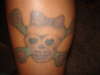 girl skull tattoo