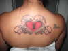 Heart w/Guns tattoo