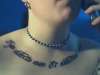 latin necklace tattoo