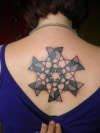geometric stars on Jill tattoo