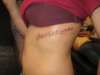 Amor Es Excrutia tattoo