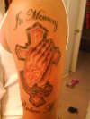 cross with praying hands tattoo