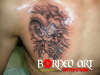 Skull tattoo by Reynold