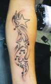 notes and stars tattoo