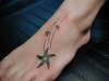 Stars on Foot tattoo