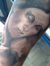 Mother and child from sleeve tattoo