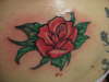 Rose on back tattoo