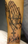 praying hands tattoo