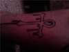 my bleeding ankh (outline) tattoo