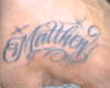 name on hand tattoo