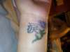 Teardrop in Chinese/ Purple Lily tattoo