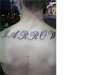 last name on back tattoo