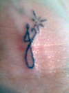 my J tattoo