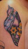 bio-mechanic shoulder tattoo